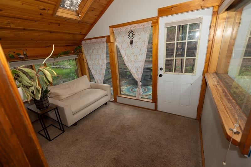 626 Bear Valley Road Loyalton, CA 96118 - Photo 20 of 39 a bed room with a bed and a window