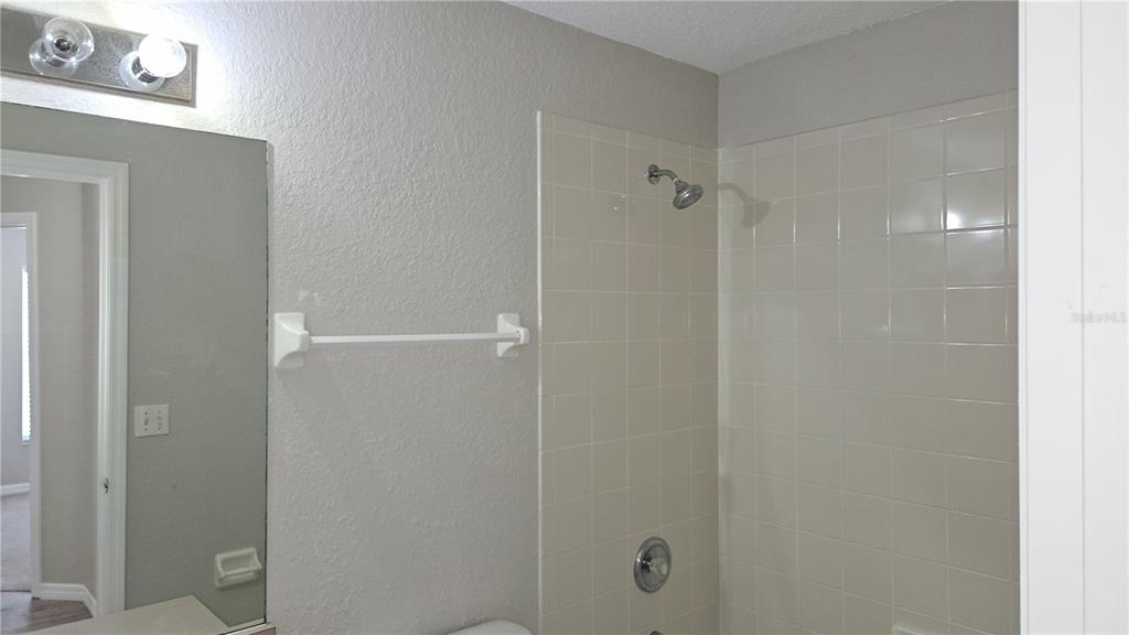 108 Brittany Road Mascotte, FL 34753 - Photo 9 of 17 a bathroom with a shower