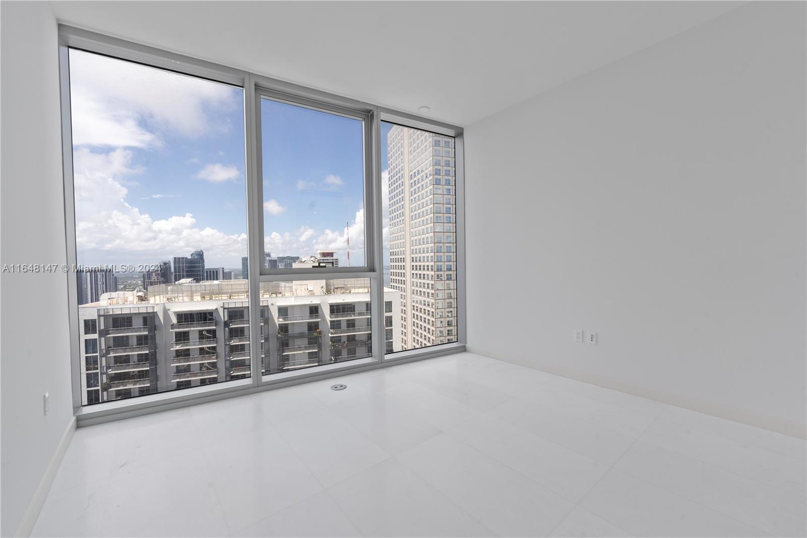 300 Biscayne Blvd Way, Unit 4604 Miami, FL 33131 - Photo 26 of 53 a view of an empty room with a large window