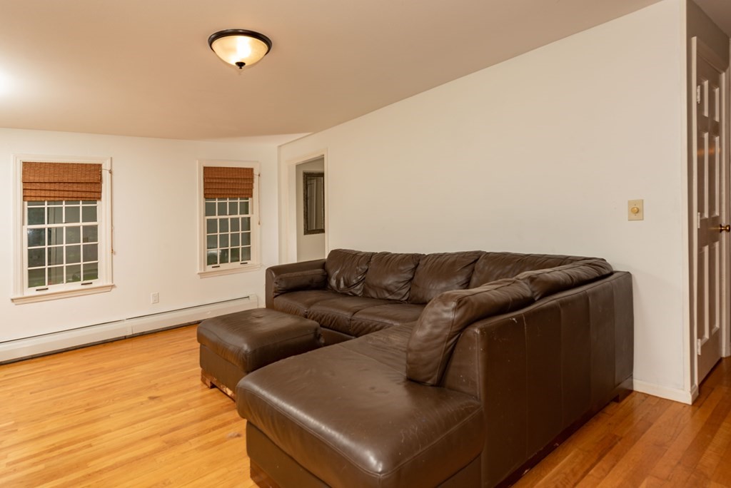 49 Point Of Pines Road Freetown, MA 02717 - Photo 3 of 32 a living room with furniture and windows