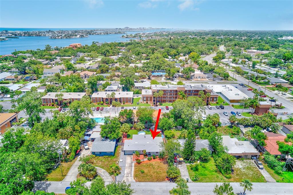 14079 Victoria Road Largo, FL 33774 - Photo 28 of 46 an aerial view of residential houses with outdoor space and trees