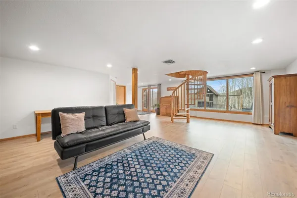 a view of livingroom with furniture and windows