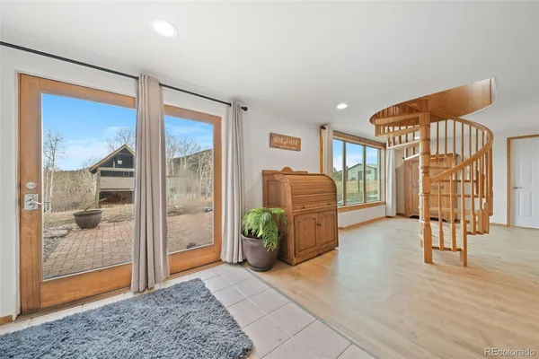 a view of kitchen with refrigerator and washer