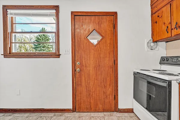 a view of an entryway with a stove