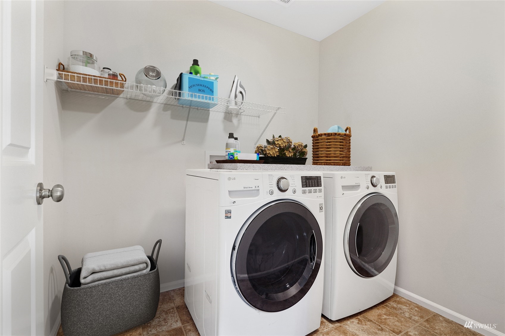 4203 167th Place Southeast Bothell, WA 98012 - Photo 22 of 38 a close up view of washer and dryer