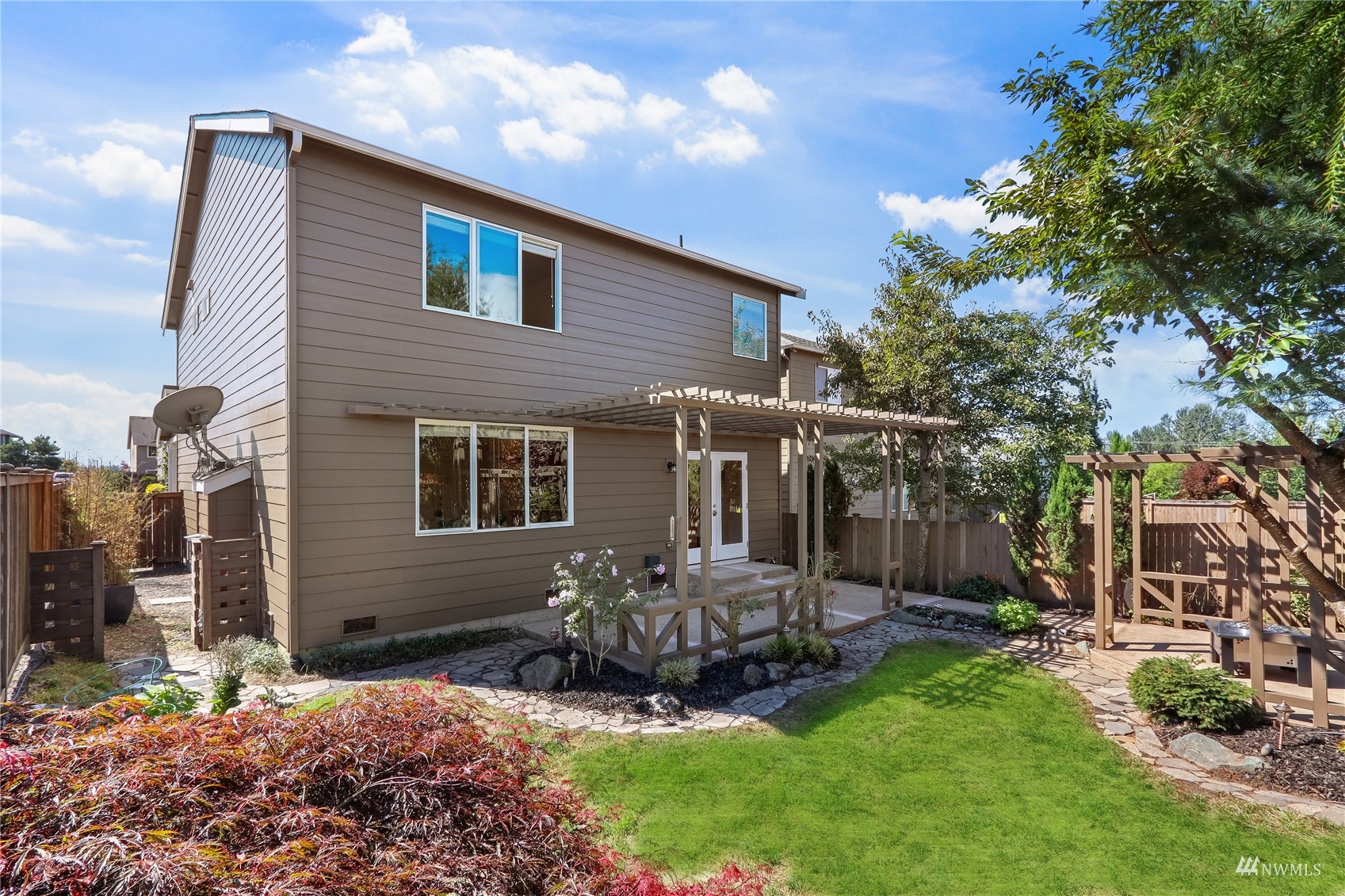 4203 167th Place Southeast Bothell, WA 98012 - Photo 31 of 38 a view of a house with backyard and sitting area