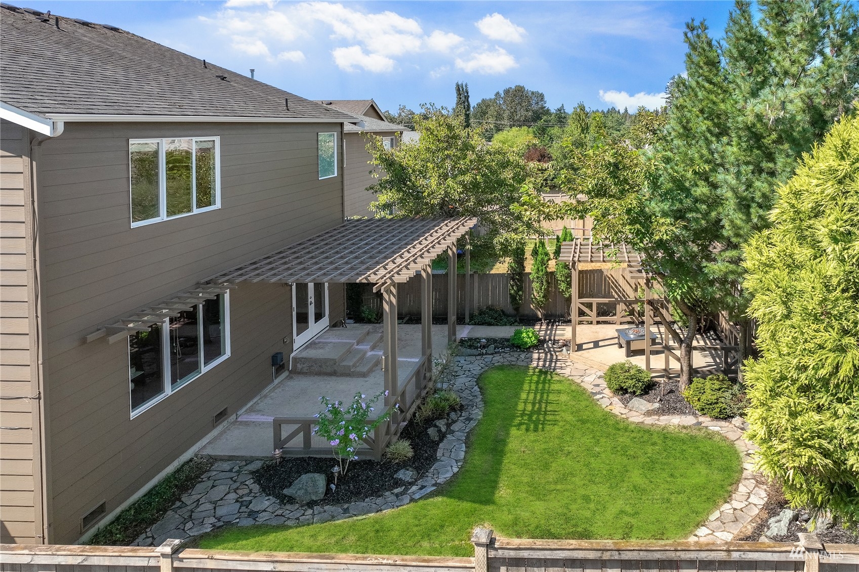 4203 167th Place Southeast Bothell, WA 98012 - Photo 34 of 38 a front view of a house with garden