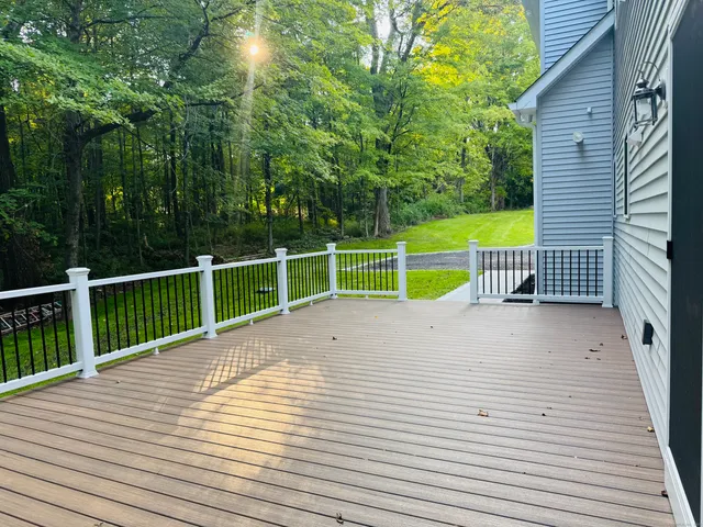 a view of a deck with a floor and fence