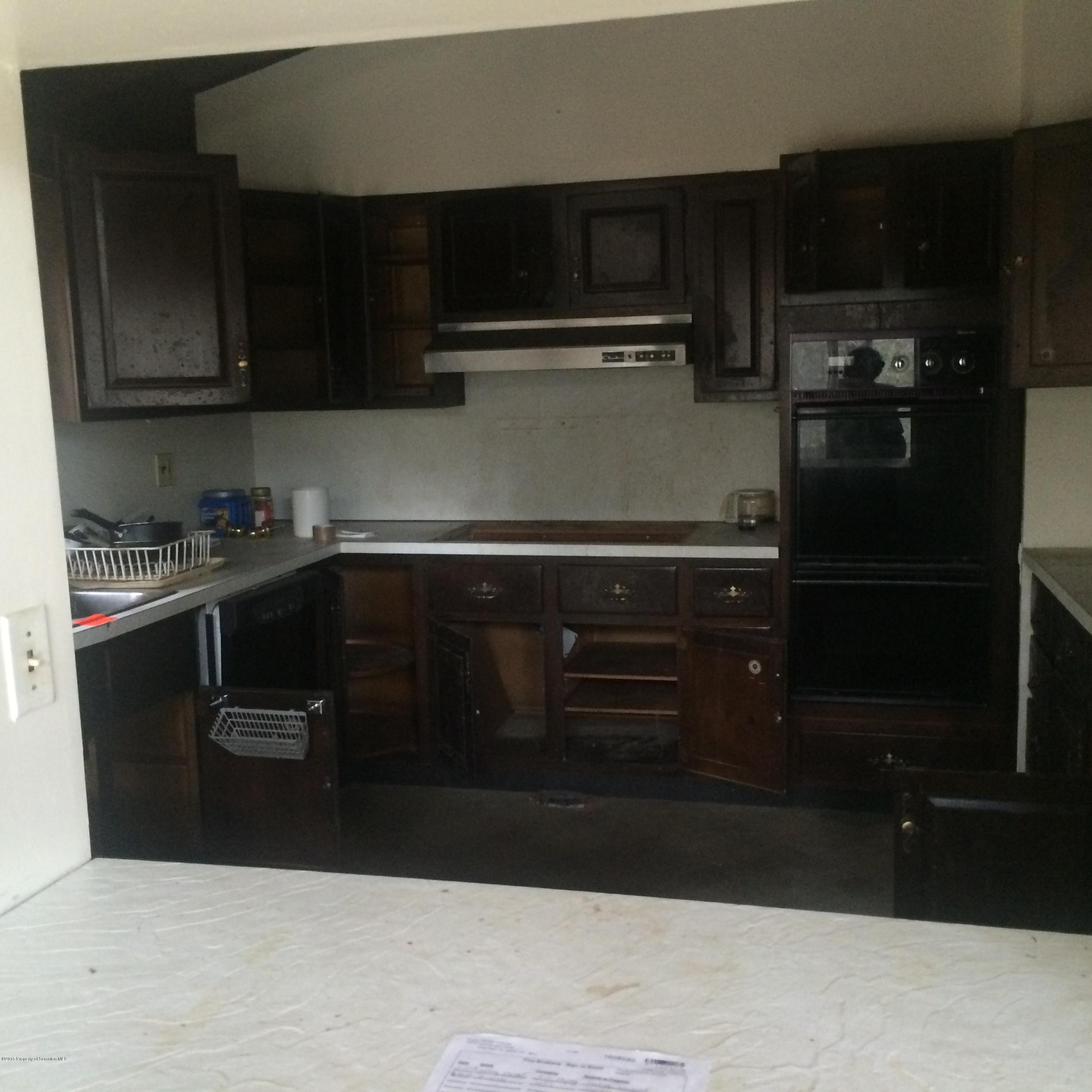 3322 Whengreen Road Nicholson, PA 18446 - Photo 9 of 15 a kitchen with a sink and cabinets