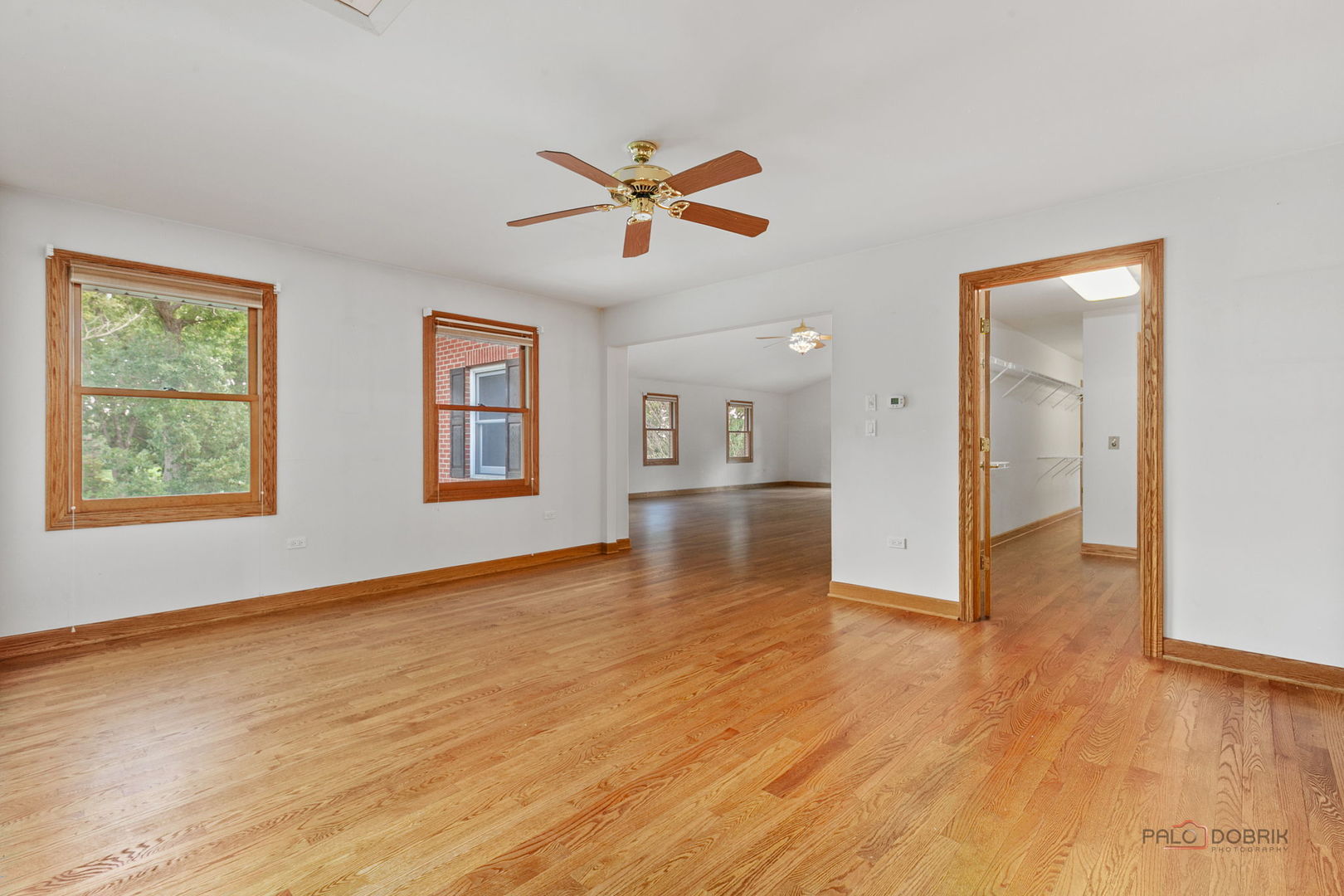 28232 North Gilmer Road Grayslake, IL 60030 - Photo 27 of 74 a view of empty room with wooden floor and fan