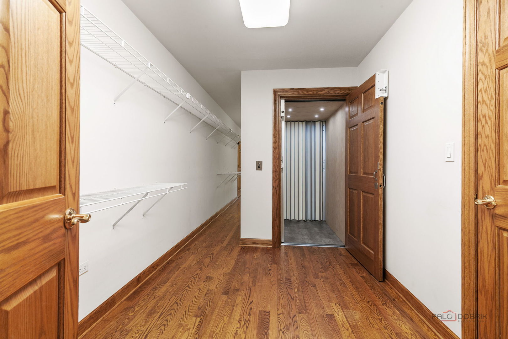28232 North Gilmer Road Grayslake, IL 60030 - Photo 28 of 74 a view of a hallway with wooden floor and staircase