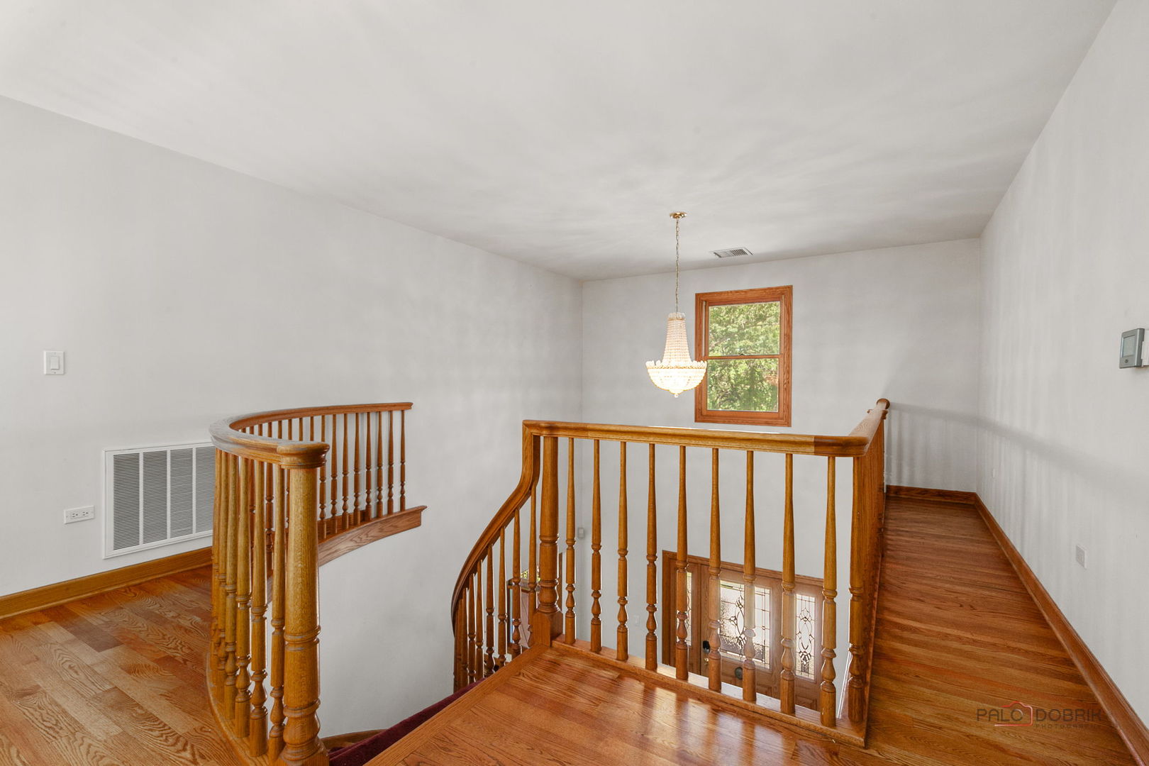 28232 North Gilmer Road Grayslake, IL 60030 - Photo 32 of 74 a view of hallway with wooden floor