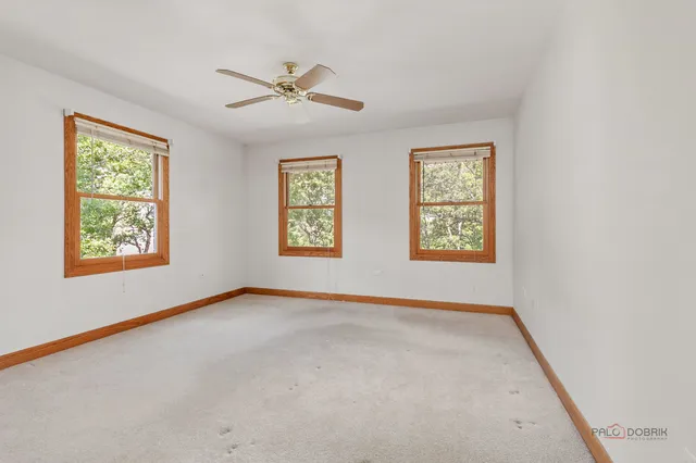 front view of a house with a big yard