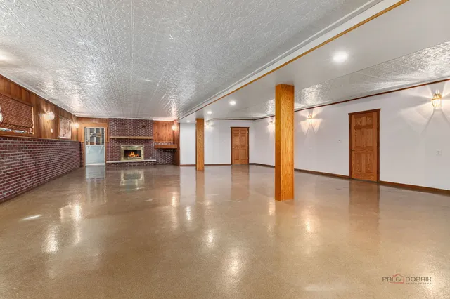 a view of an empty room with a balcony