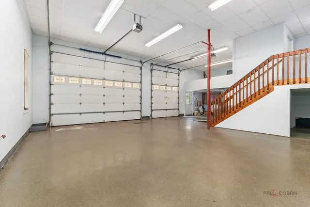 a view of a house with a street