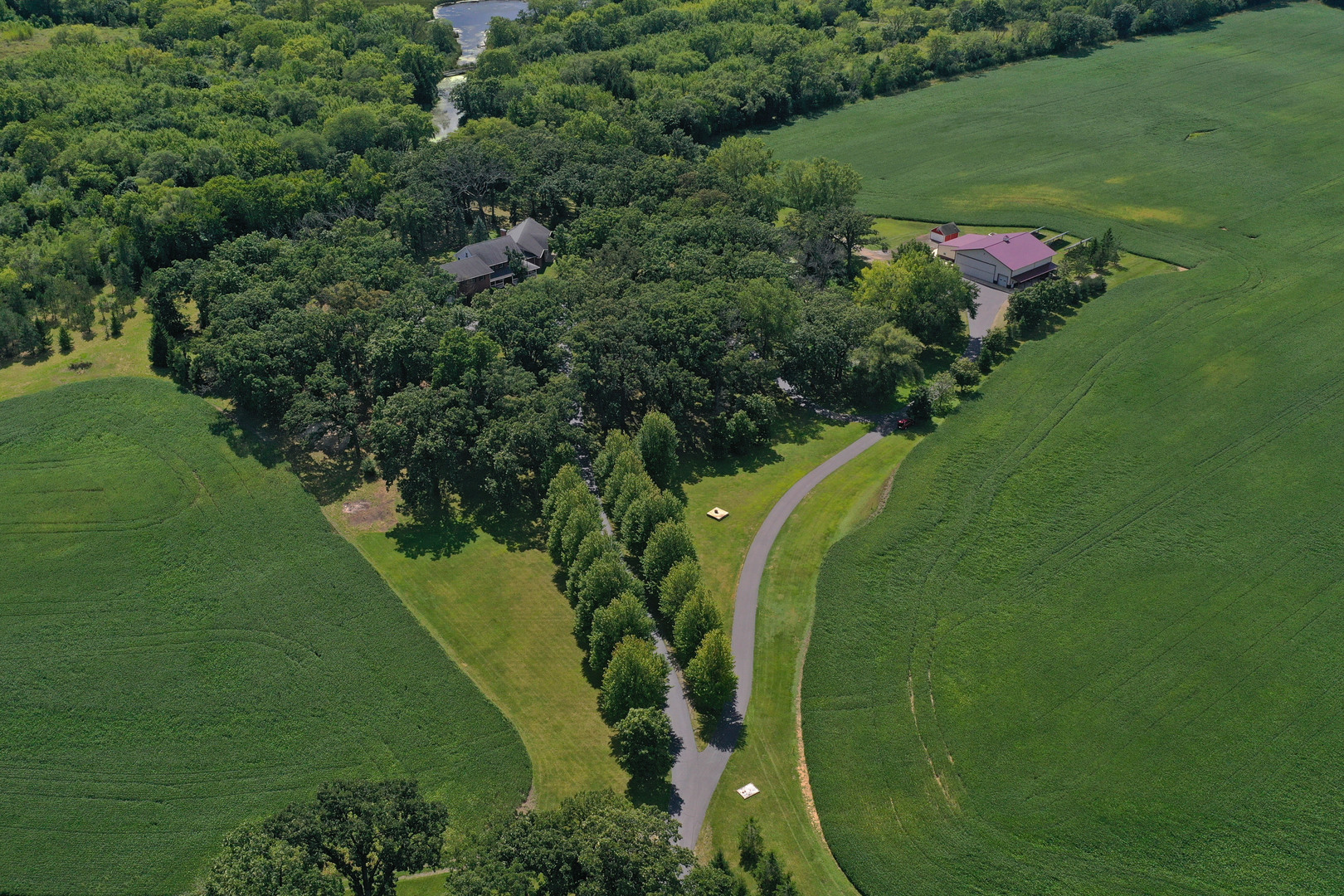 28232 North Gilmer Road Grayslake, IL 60030 - Photo 71 of 74 an aerial view of a golf course with parking space and lake view
