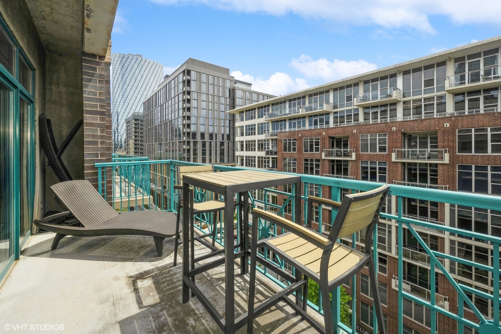 910 West Madison Street, Unit 802 Chicago, IL 60607 - Photo 13 of 13 a view of a chairs and table in the balcony