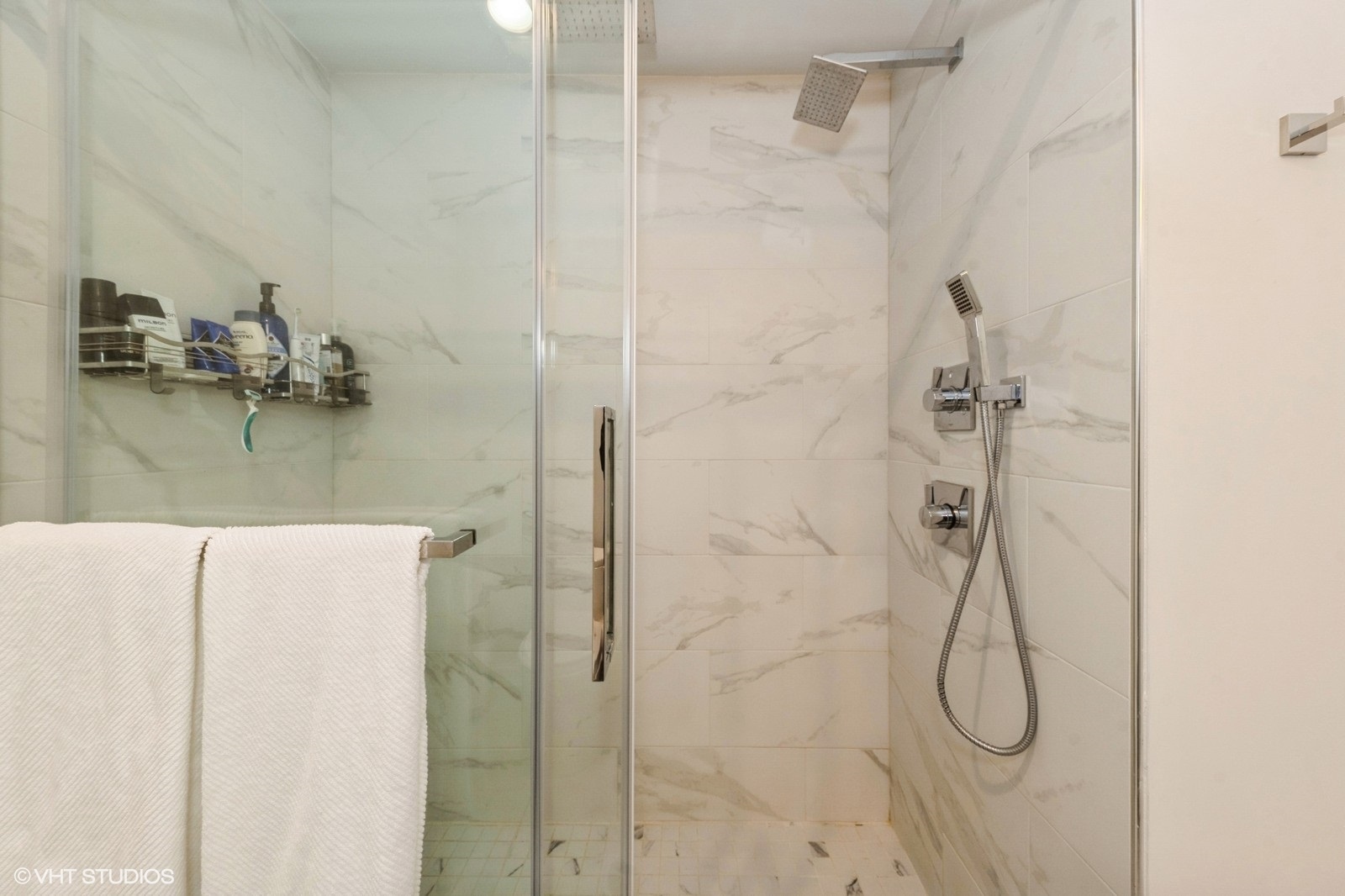 910 West Madison Street, Unit 802 Chicago, IL 60607 - Photo 10 of 13 a bathroom with a shower