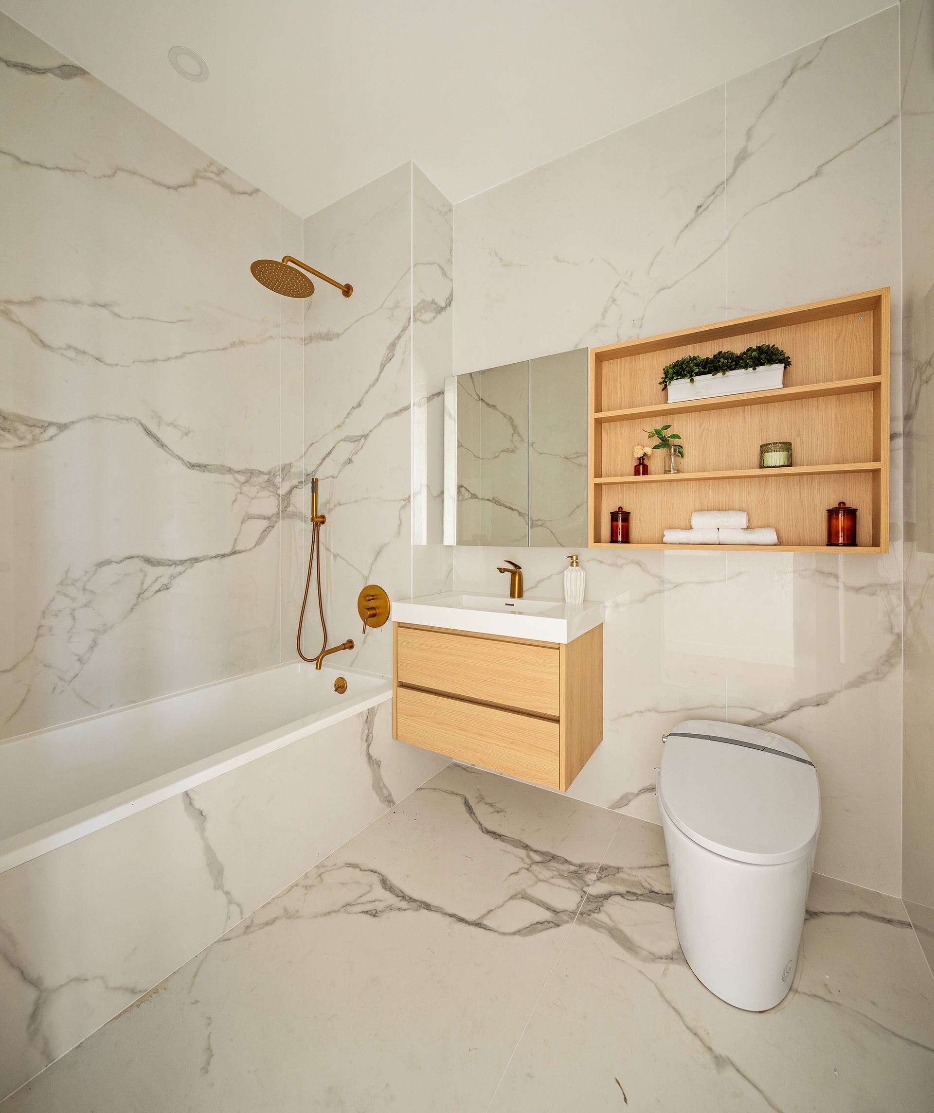 1027 Bushwick Avenue, Unit 4A Brooklyn, NY 11221 - Photo 6 of 12 a bathroom with a sink a toilet and bathtub