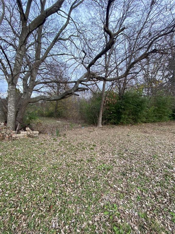 2714 Henry Road Lancaster, TX 75134 - Photo 14 of 19 a view of backyard with green space
