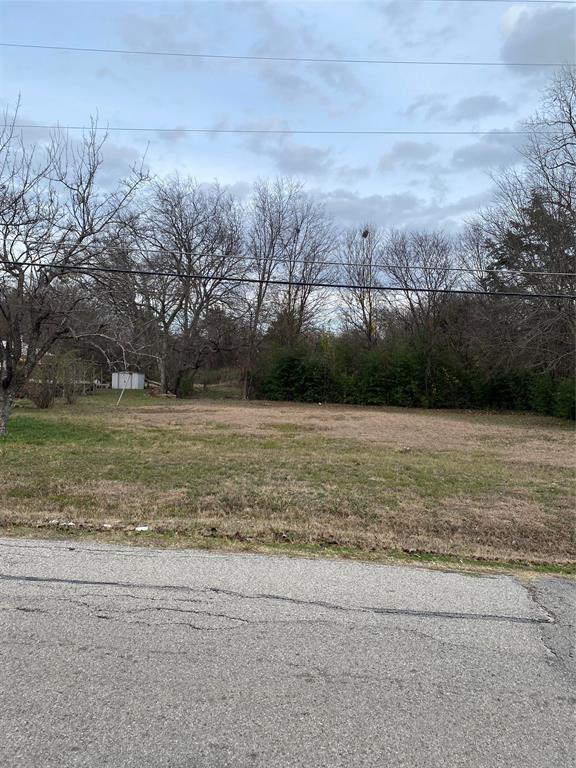 2714 Henry Road Lancaster, TX 75134 - Photo 18 of 19 a view of a yard with a house