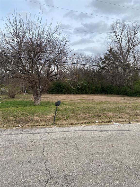 2714 Henry Road Lancaster, TX 75134 - Photo 19 of 19 a view of a yard with a bench