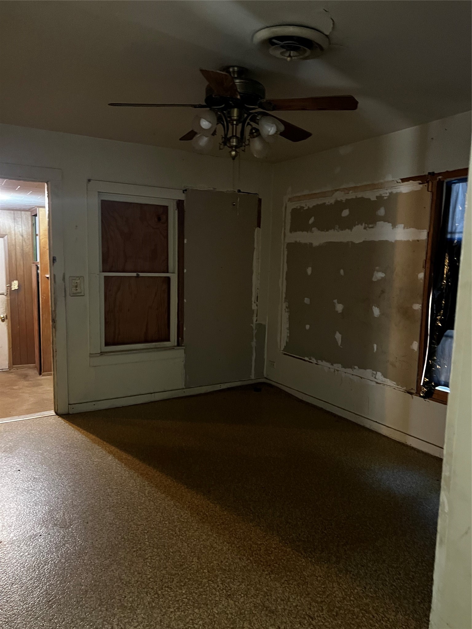 615 North 4th Ganado, TX 77962 - Photo 8 of 19 a view of a livingroom with a ceiling fan and window