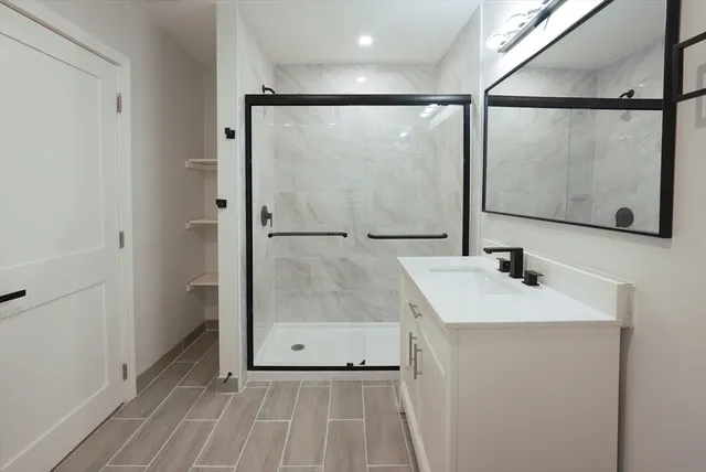 a bathroom with a sink and a mirror