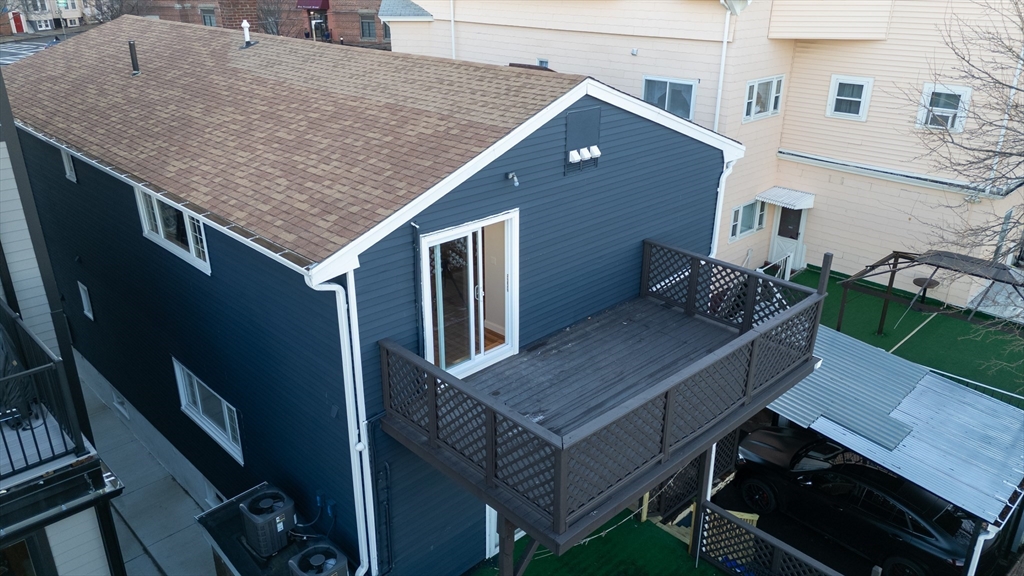 262 East Eagle Street, Unit 2 Boston, MA 02128 - Photo 18 of 24 an aerial view of a house roof deck