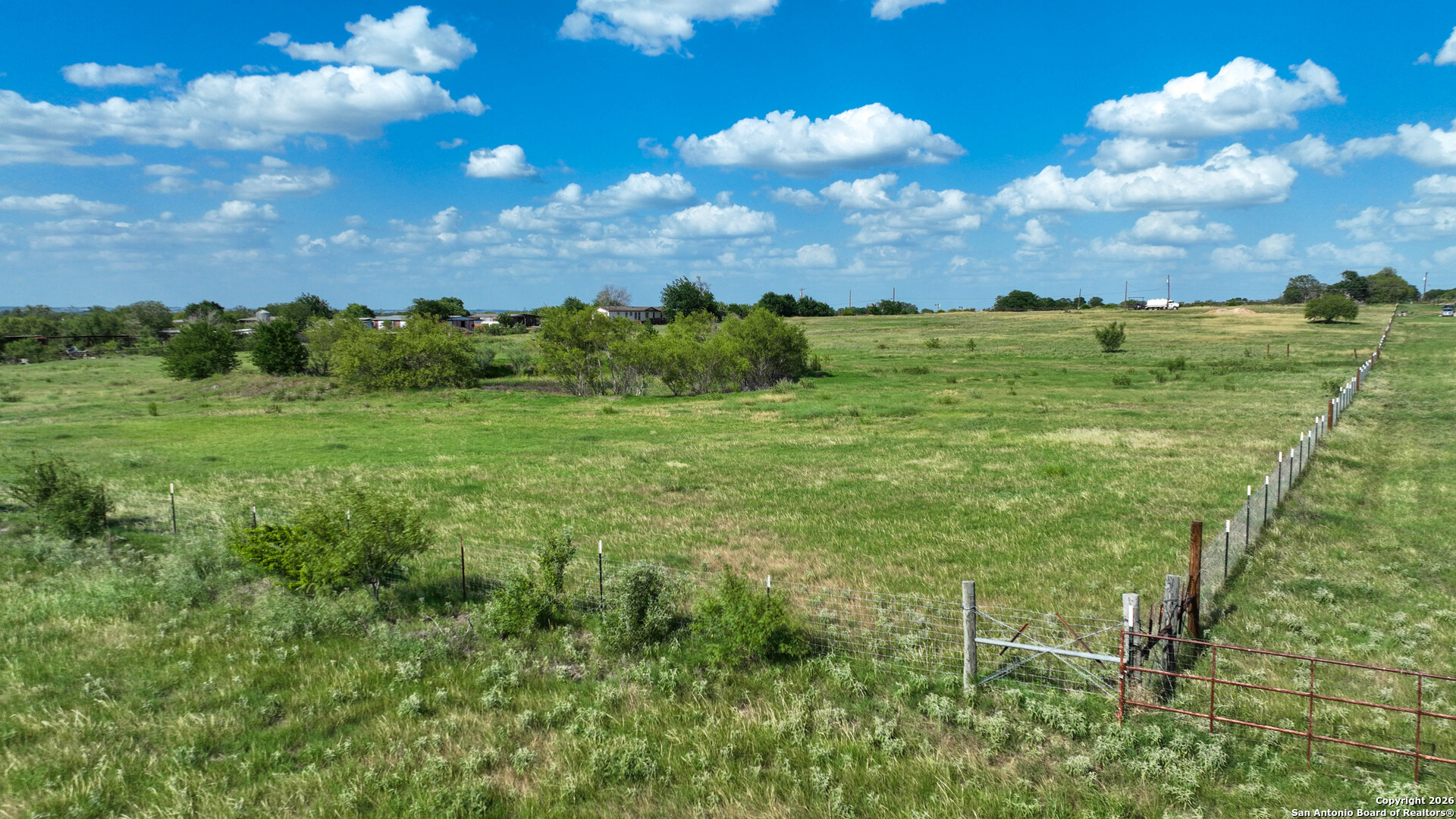 12725 Wisdom Road Atascosa, TX 78002 - Photo 18 of 18 a view of an outdoor space and a yard
