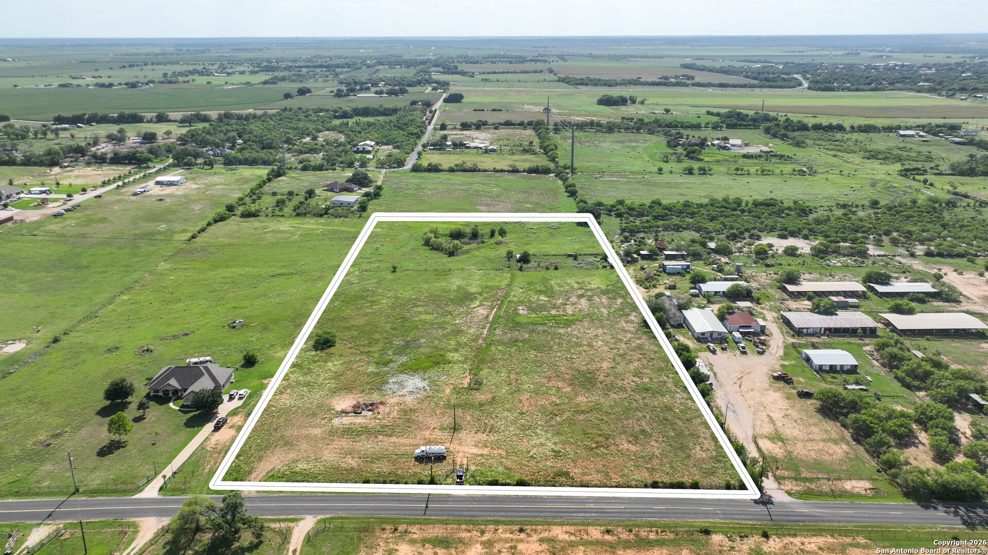 12725 Wisdom Road Atascosa, TX 78002 - Photo 9 of 18 an aerial view of residential houses with outdoor space
