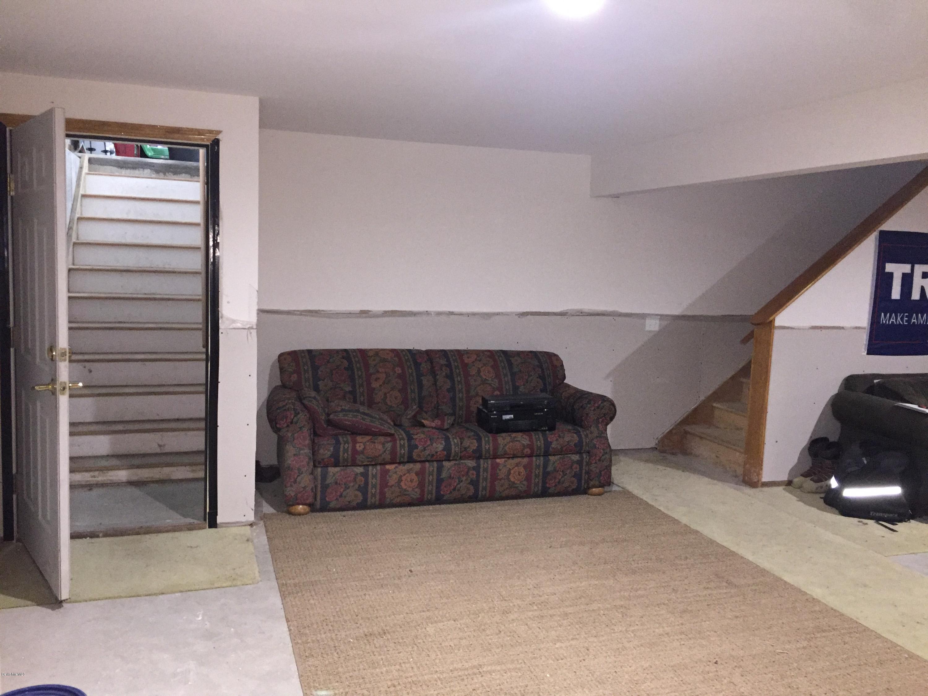 560 South Mountain Road Pittsfield, MA 01201 - Photo 23 of 36 Basement access to living room.