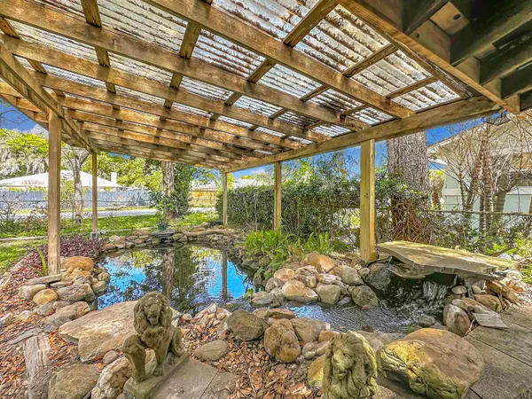 a view of a yard with an outdoor space
