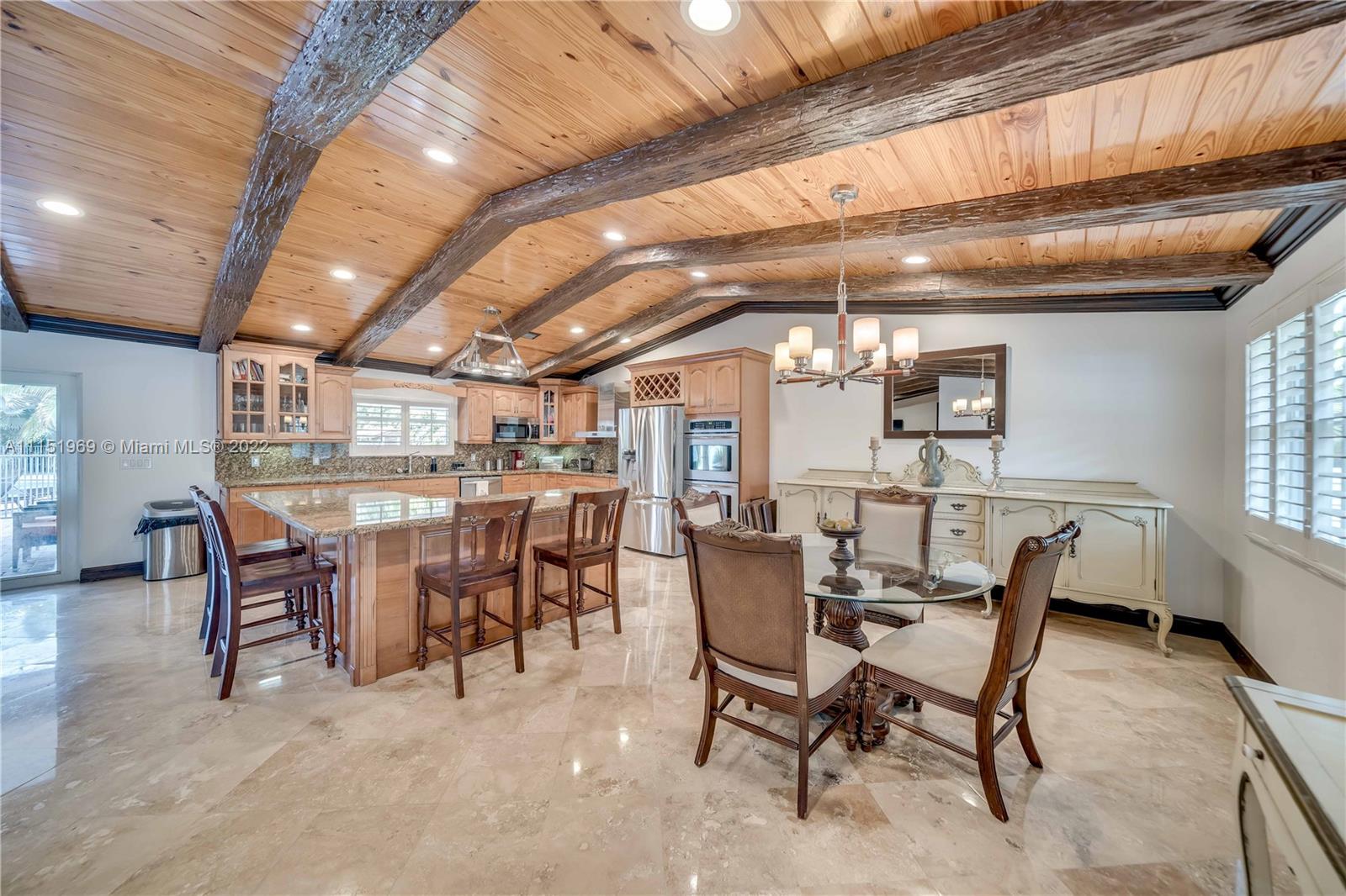 5001 Southwest 196th Lane Southwest Ranches, FL 33332 - Photo 7 of 72 a view of a dining room with furniture window and outside view
