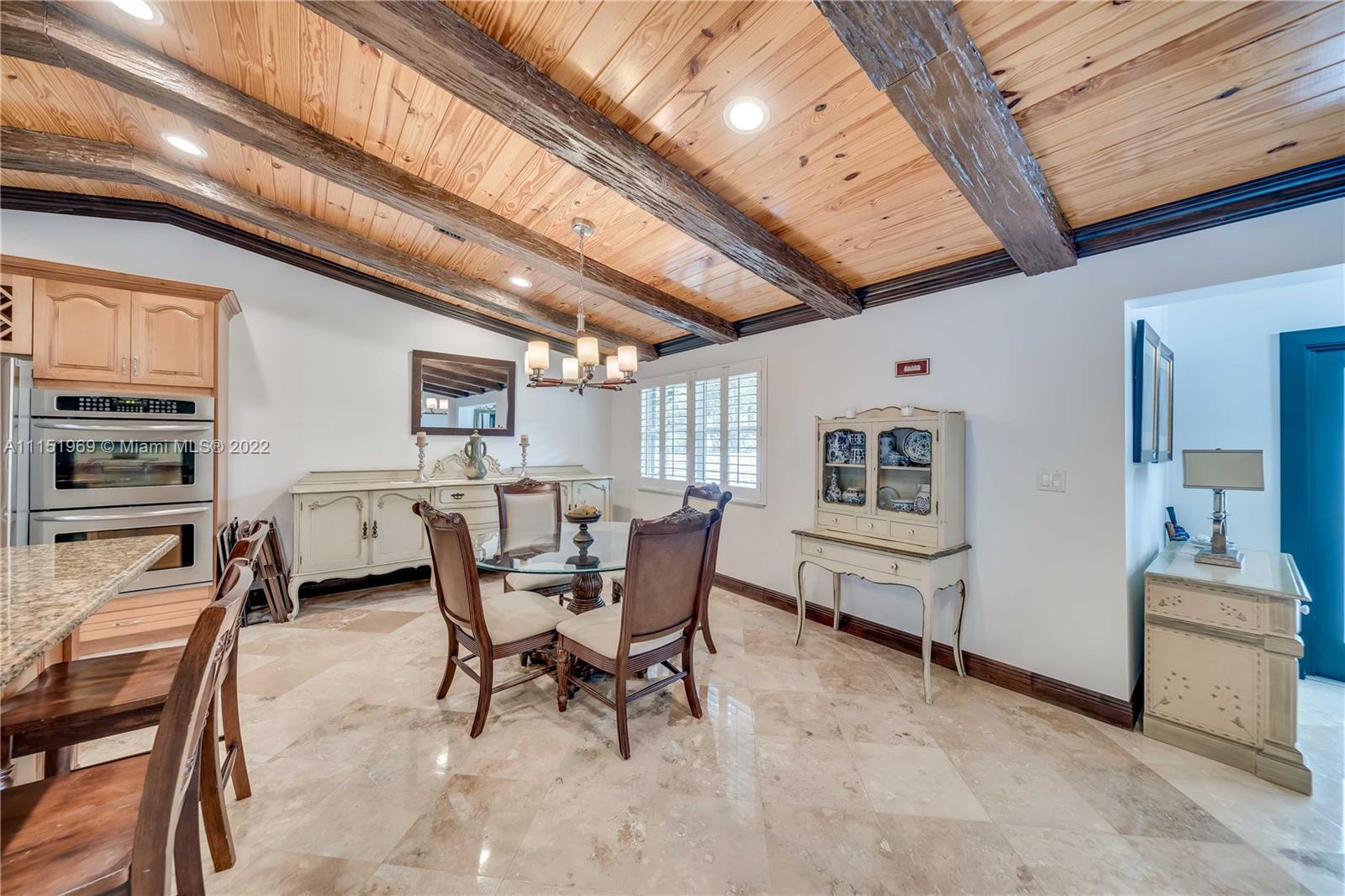 5001 Southwest 196th Lane Southwest Ranches, FL 33332 - Photo 8 of 72 a dining room with furniture and window