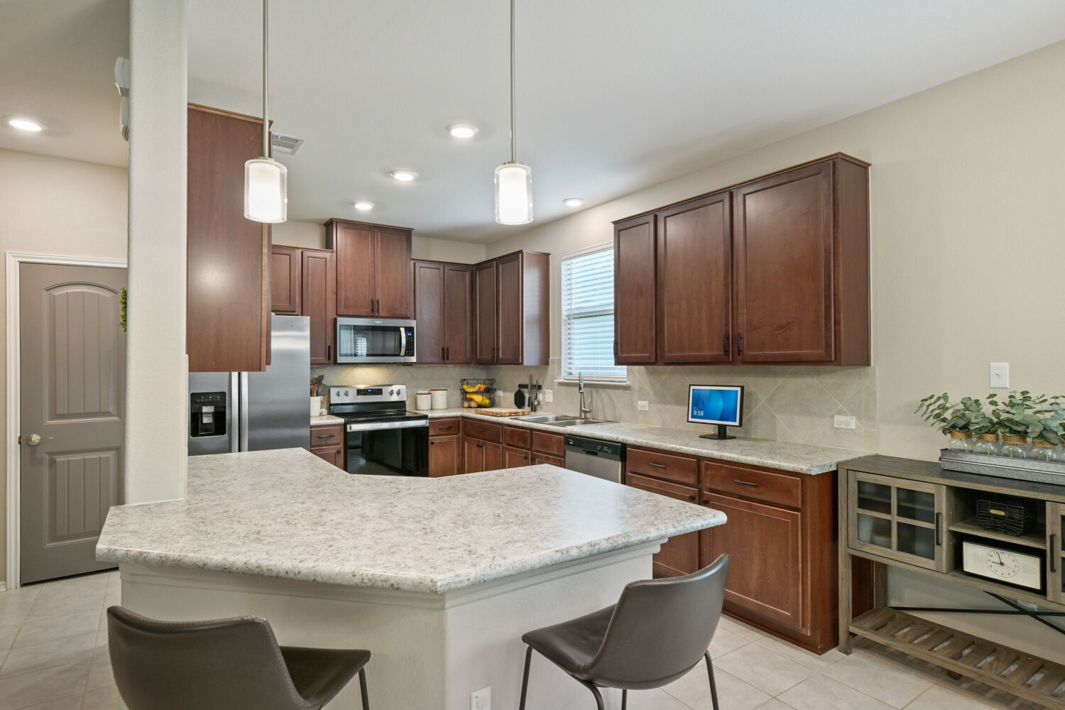 175 Gustaf Trail Kyle, TX 78640 - Photo 12 of 28 Kitchen open to living room