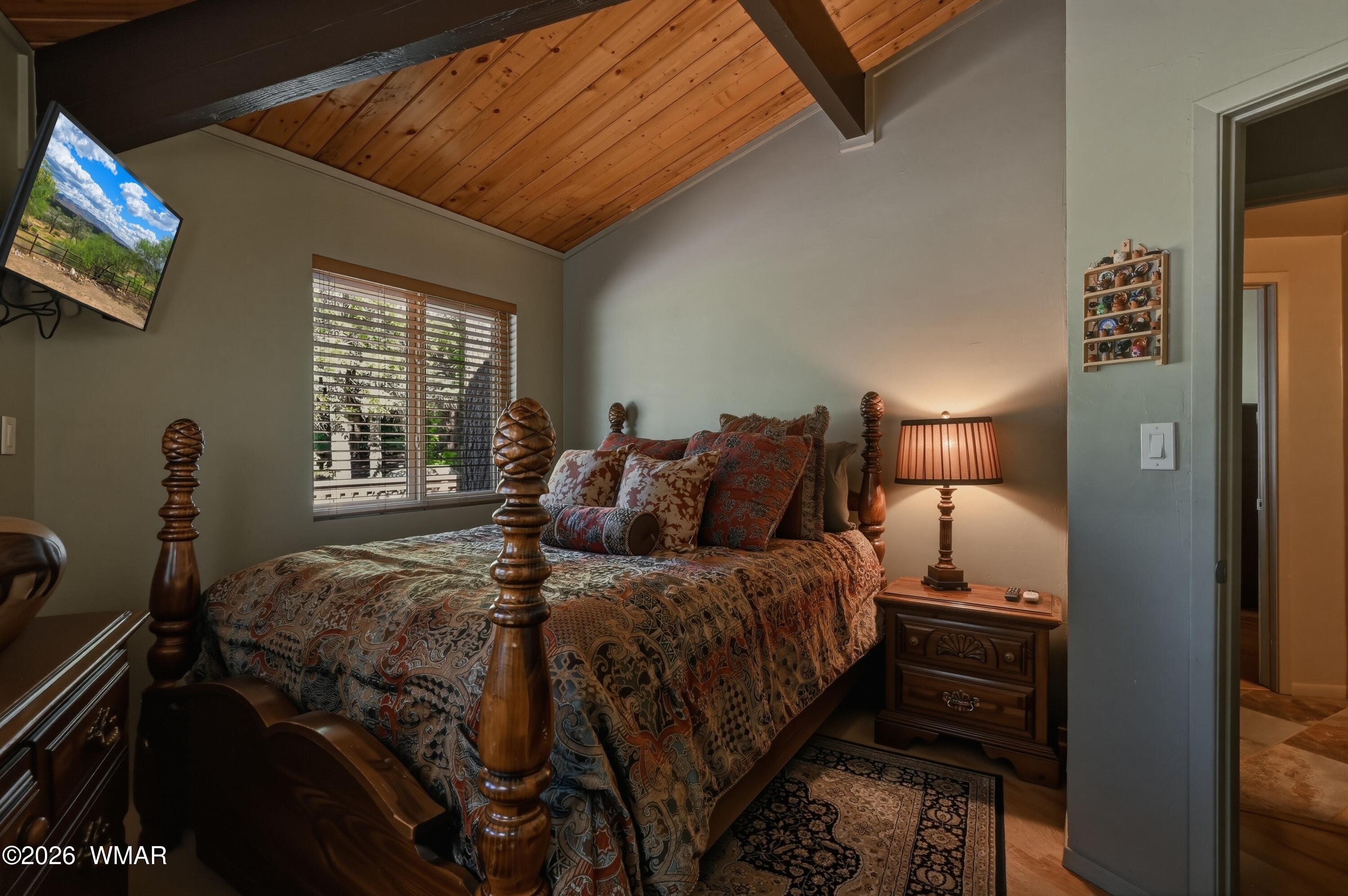 285 Box Elder Payson, AZ 85541 - Photo 21 of 37 a bedroom with a bed and wooden floor