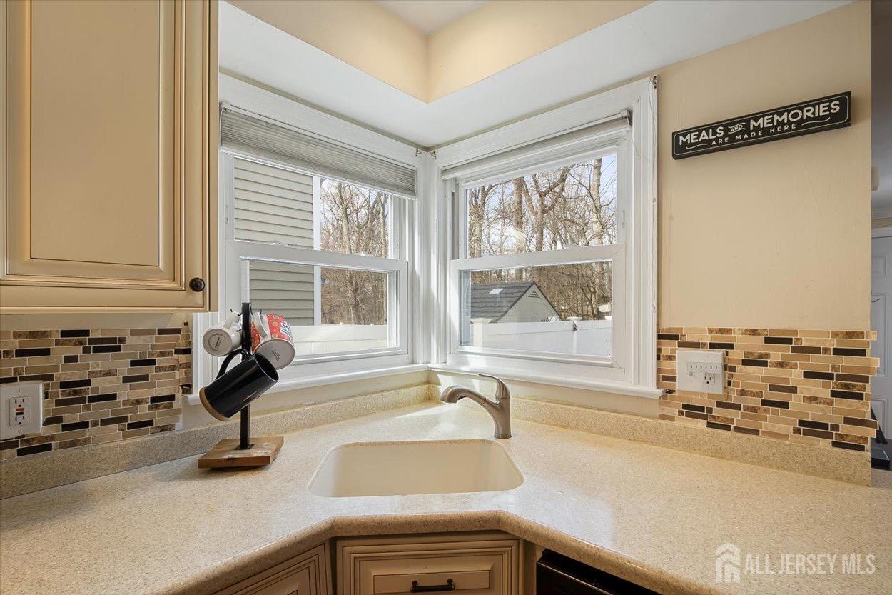 580 Schuyler Way Union, NJ 07083 - Photo 13 of 30 a kitchen with a large window and a sink