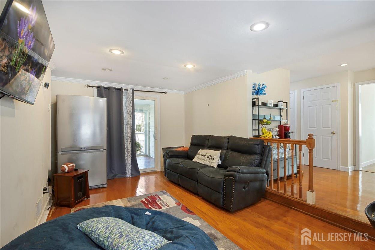 580 Schuyler Way Union, NJ 07083 - Photo 17 of 30 a living room with furniture and a flat screen tv