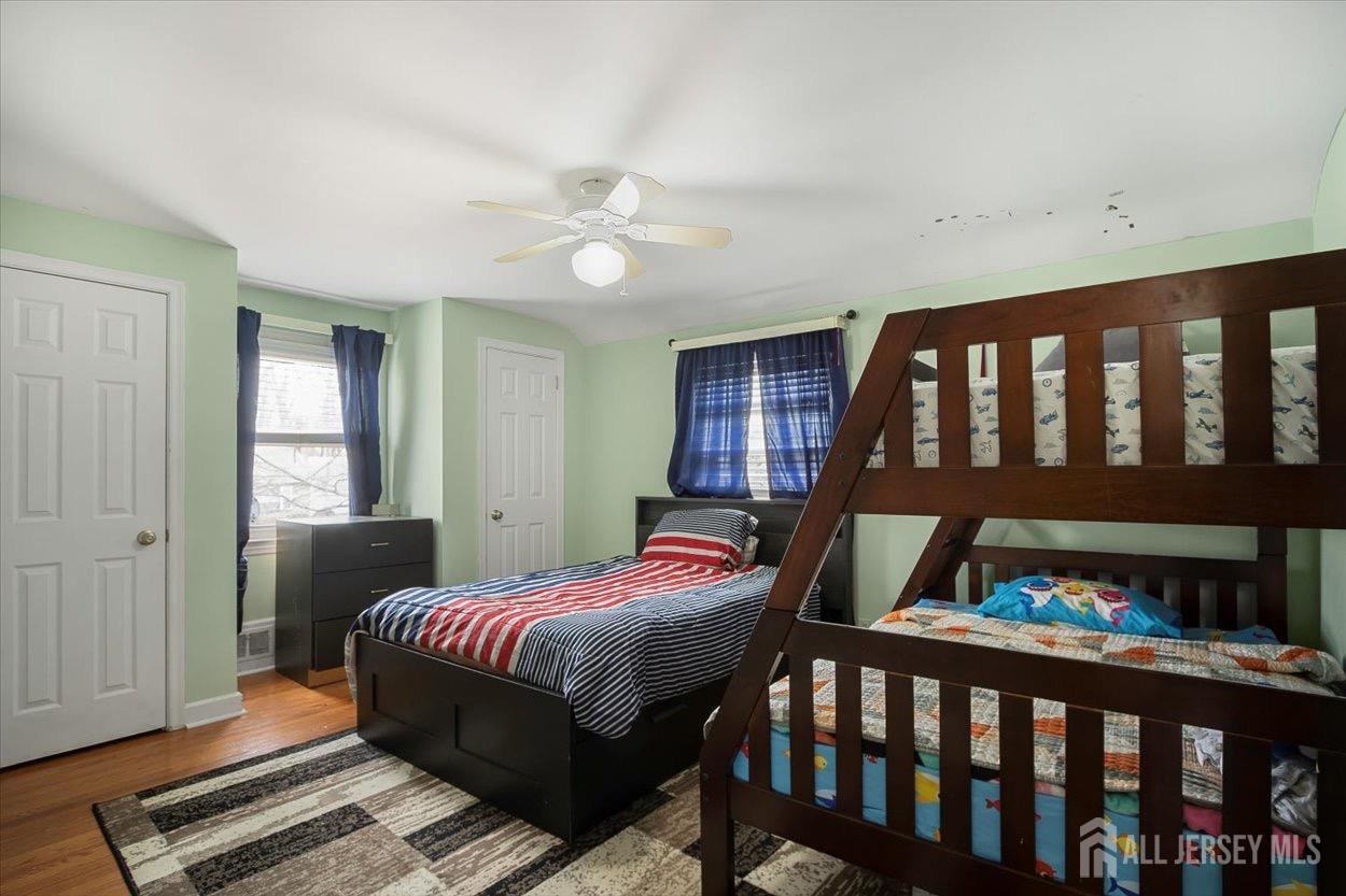 580 Schuyler Way Union, NJ 07083 - Photo 28 of 30 a bedroom with a bed and a window