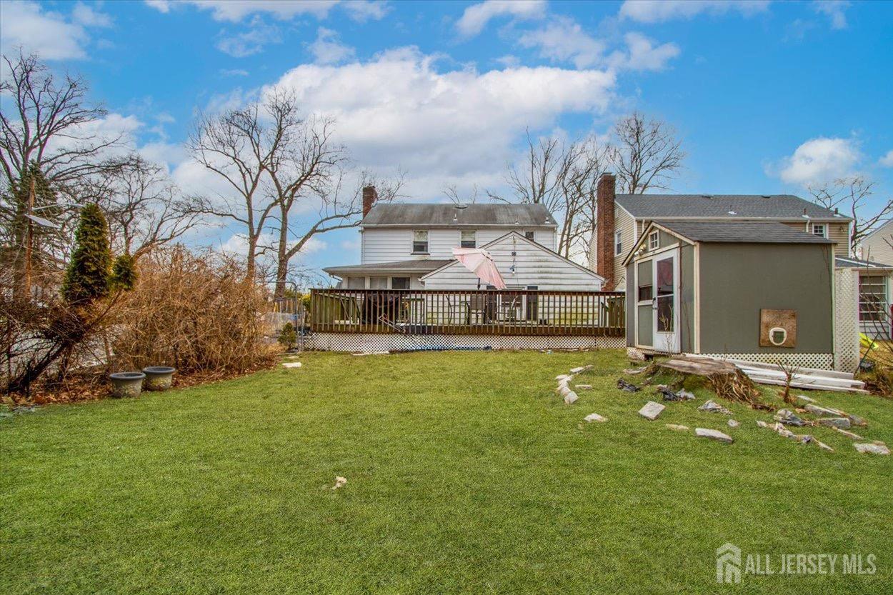 580 Schuyler Way Union, NJ 07083 - Photo 7 of 30 a swimming pool with outdoor seating and yard