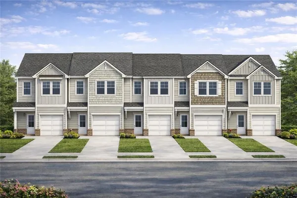 front view of a house with a small yard