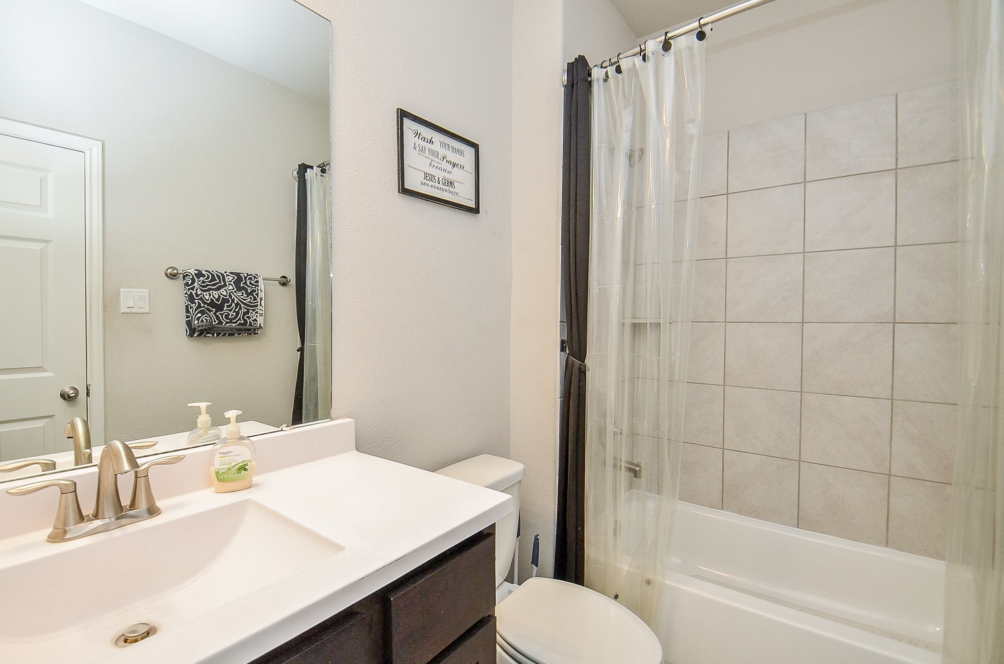 10519 Scrub Oak Drive Rosharon, TX 77583 - Photo 26 of 32 a bathroom with a sink toilet and shower