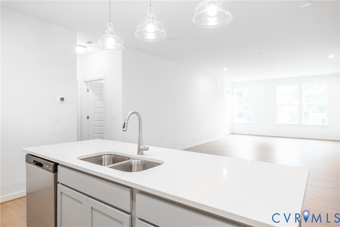 4005 Next Level Trace Midlothian, VA 23112 - Photo 5 of 28 a close view of a sink a faucet and appliance in the kitchen