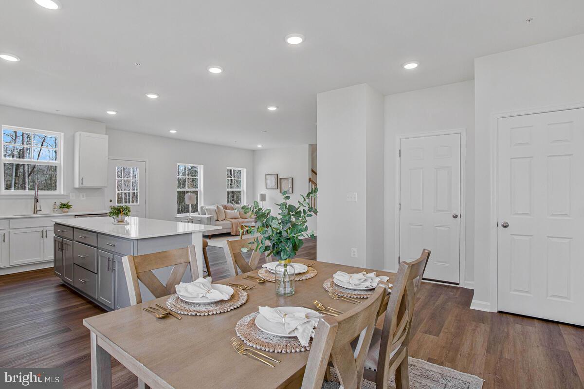 1225 Juniper Street Shady Side, MD 20764 - Photo 10 of 32 a dining room with furniture and wooden floor