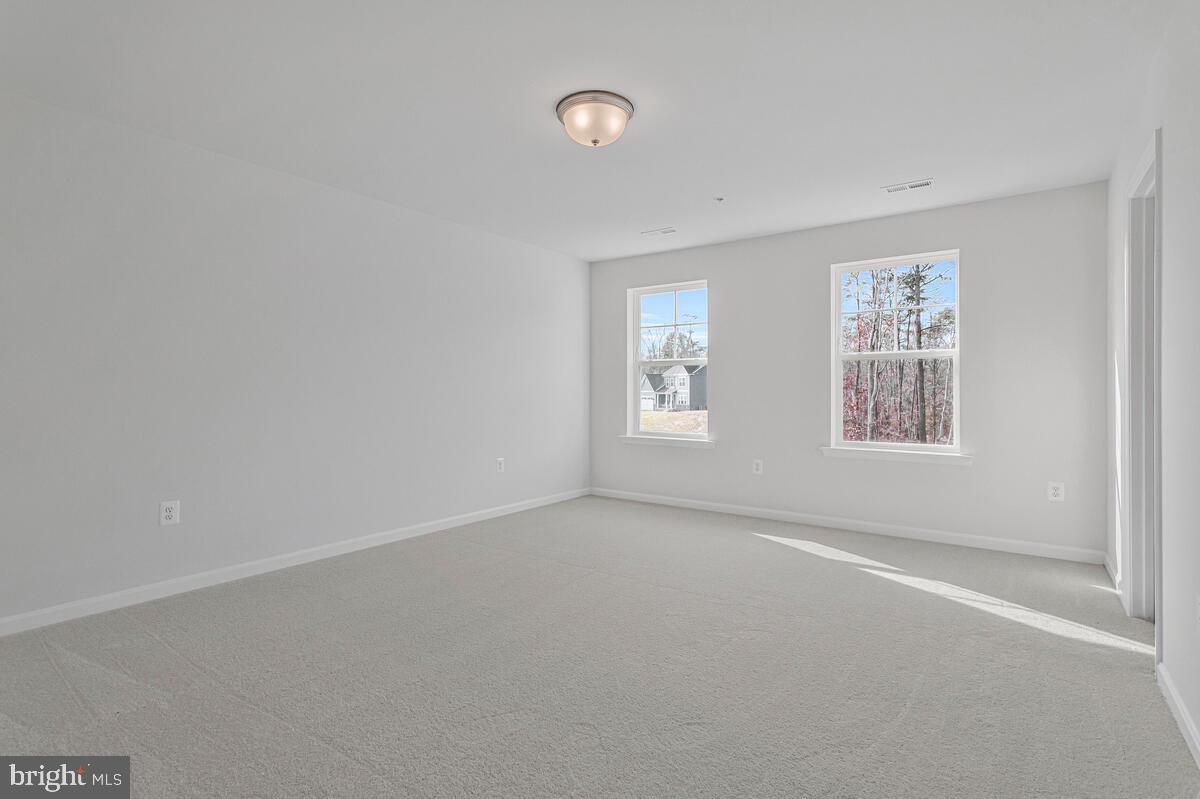 1225 Juniper Street Shady Side, MD 20764 - Photo 26 of 33 an empty room with windows