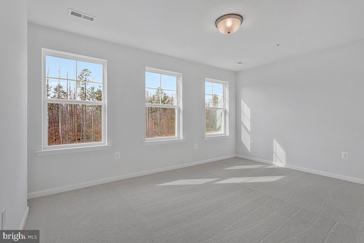 1225 Juniper Street Shady Side, MD 20764 - Photo 27 of 33 an empty room with windows