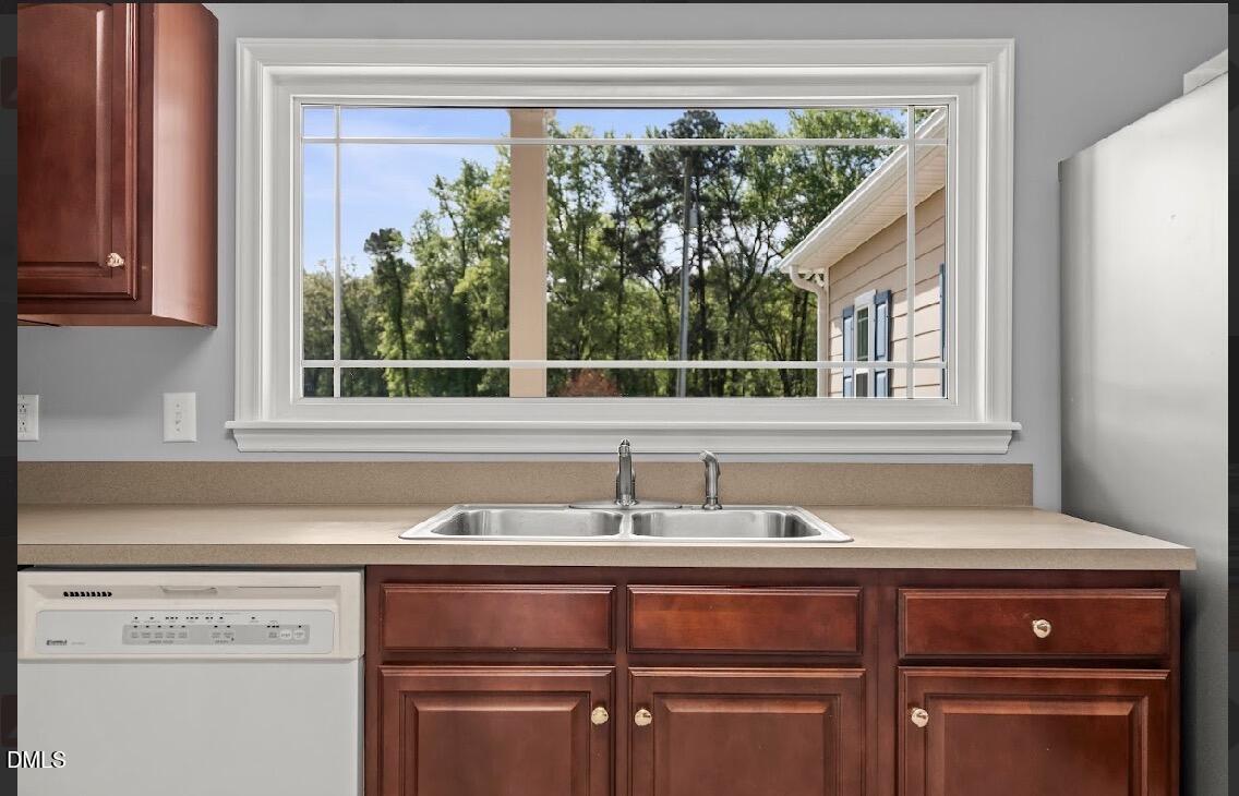 5780 McArthur Road Broadway, NC 27505 - Photo 14 of 40 a sink sitting next to a window