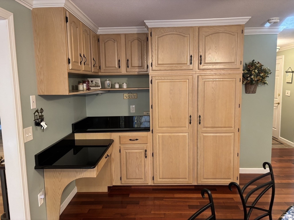 43 Wishing Well Way West Springfield, MA 01089 - Photo 14 of 42 a kitchen with a refrigerator and cabinets