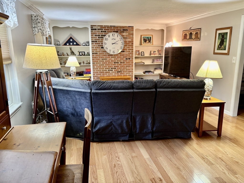 43 Wishing Well Way West Springfield, MA 01089 - Photo 18 of 42 a living room with furniture and wooden floor